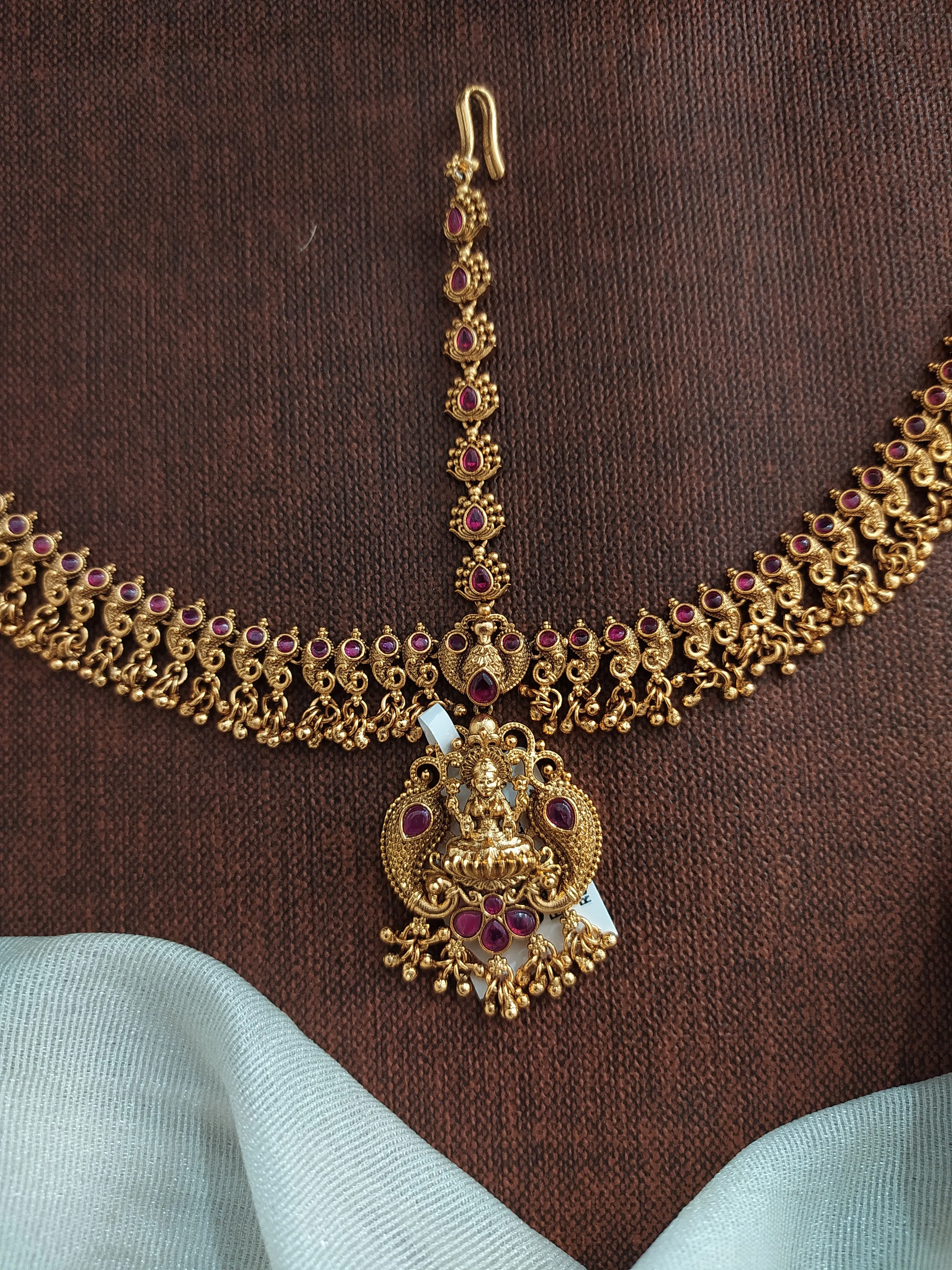 Antique Copper Finish Tikka Set with Lakshmi Design and Red & Golden Ball Hangings