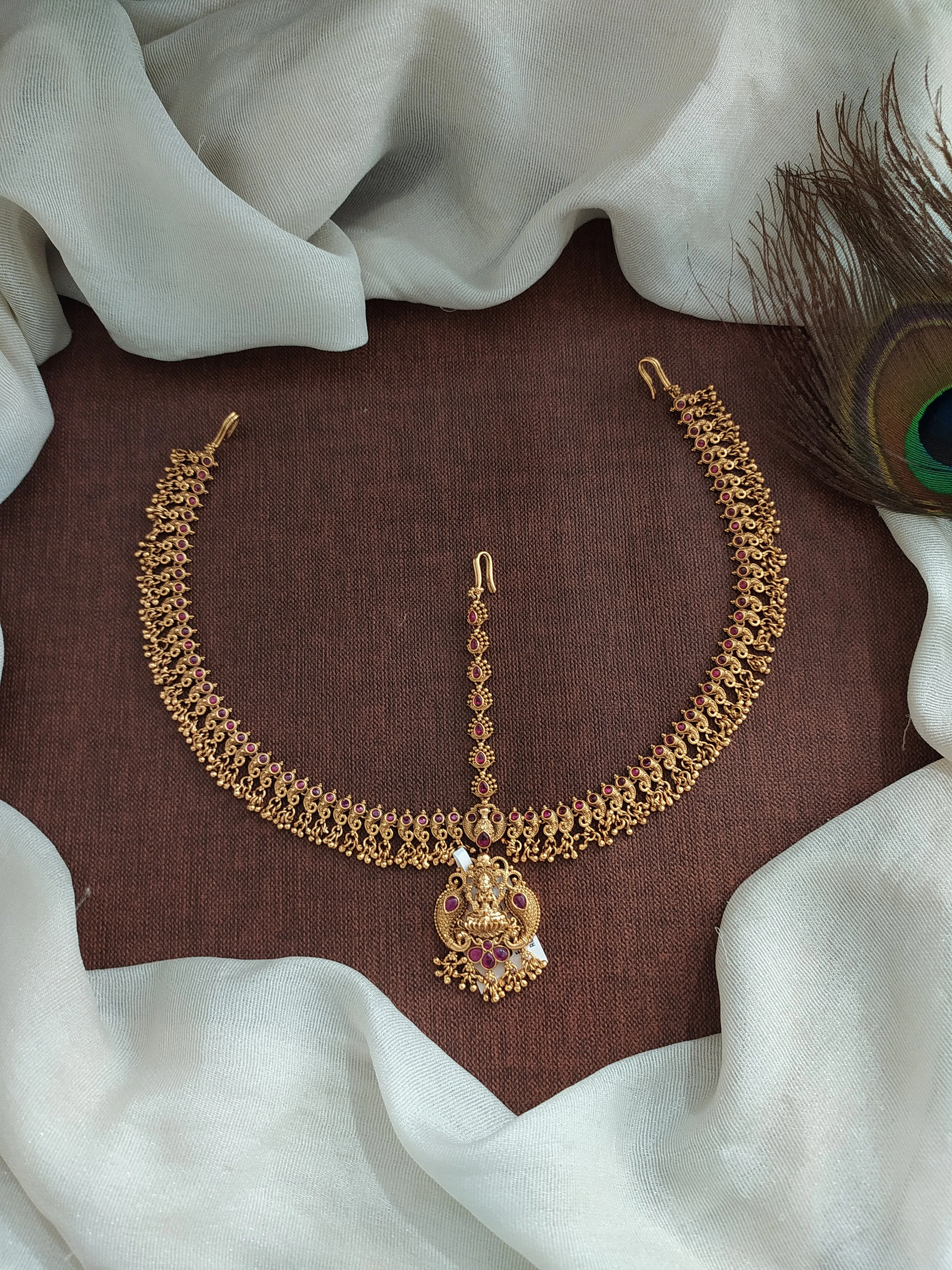 Antique Copper Finish Tikka Set with Lakshmi Design and Red & Golden Ball Hangings