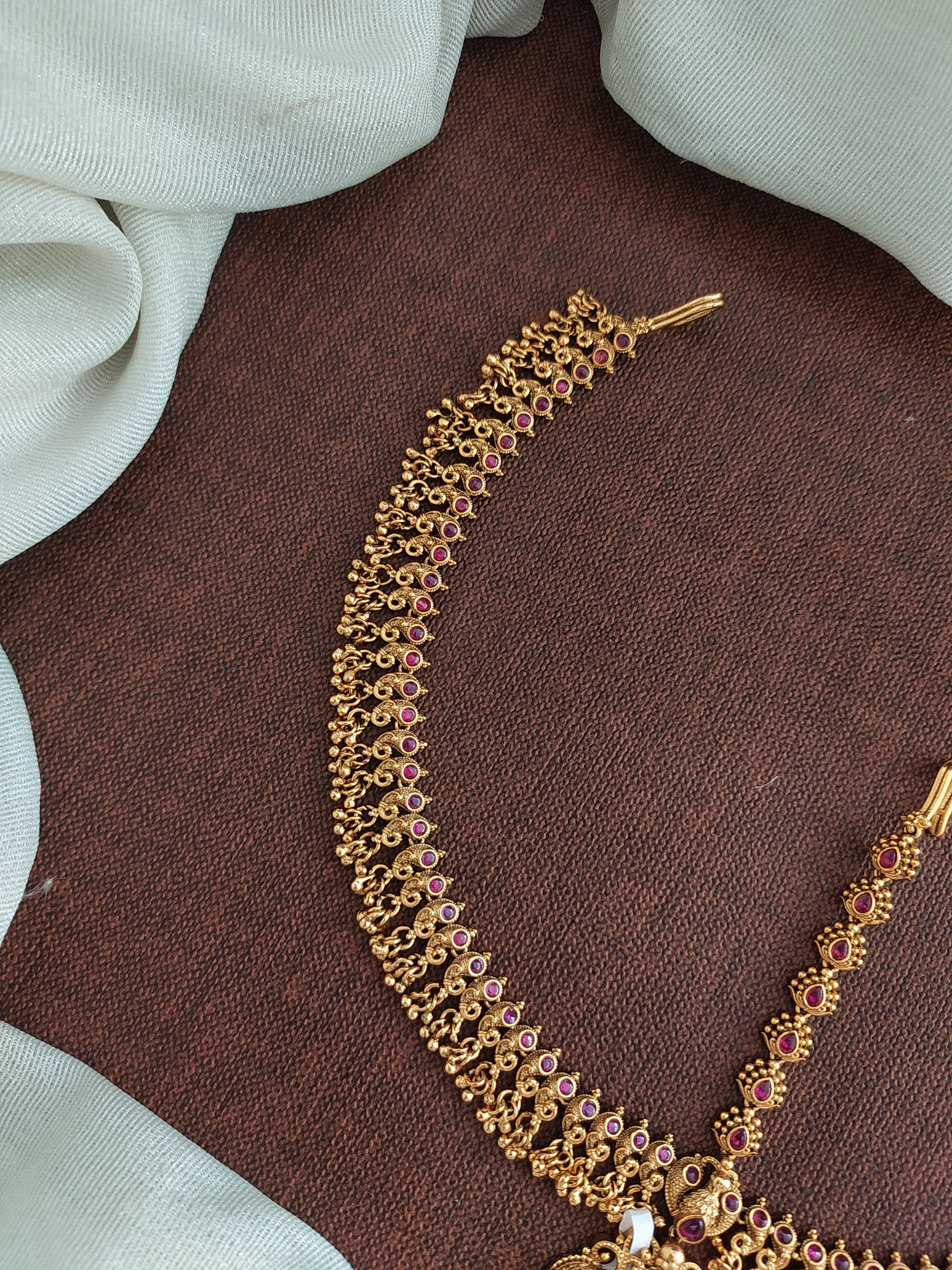 Antique Copper Finish Tikka Set with Lakshmi Design and Red & Golden Ball Hangings