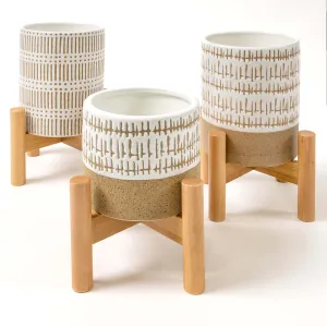 SET OF THREE SMALL STONEWARE POTS WITh STANDS - The large pots are 5.75" high.  The small pot is3.5" high. All three have a stand