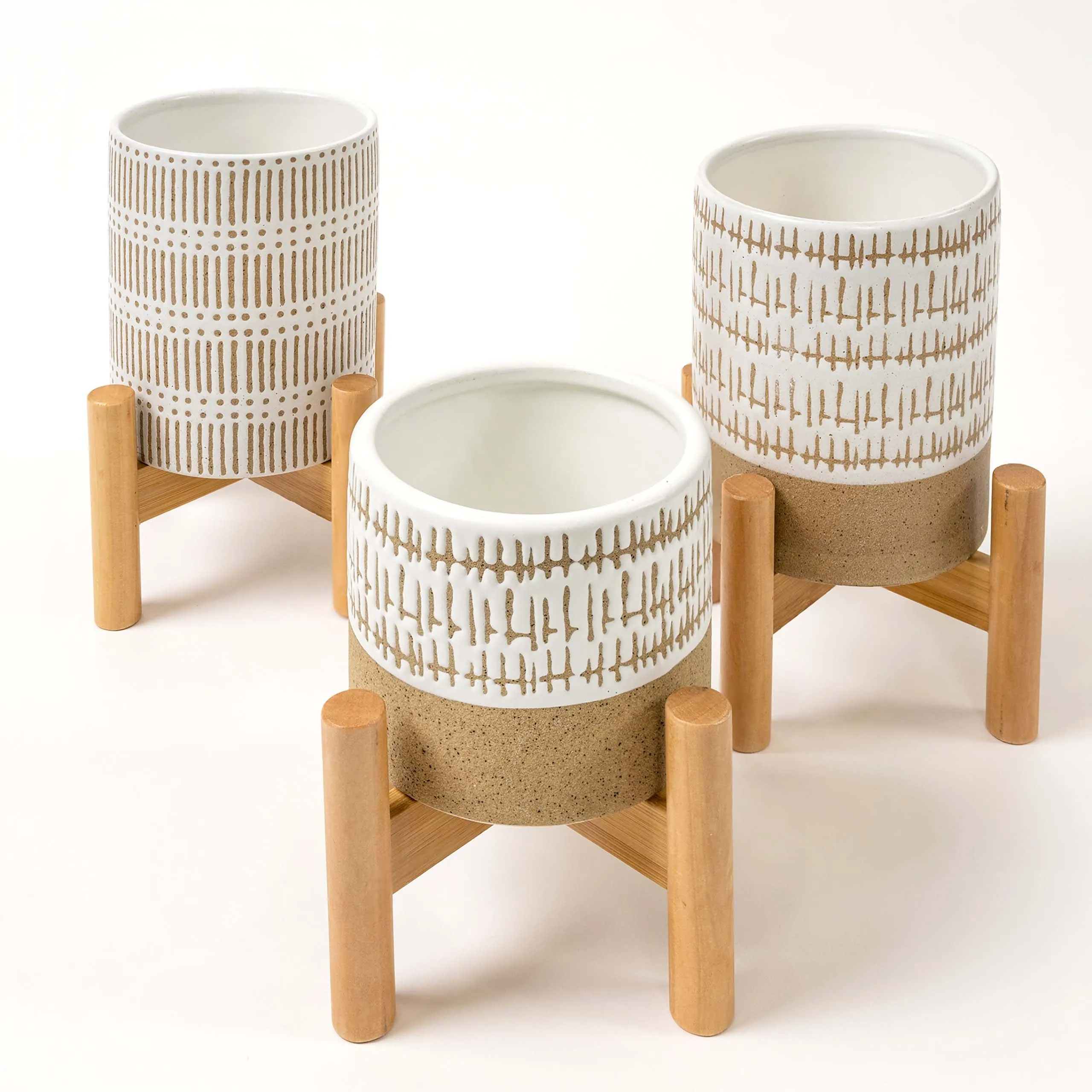 SET OF THREE SMALL STONEWARE POTS WITh STANDS - The large pots are 5.75" high.  The small pot is3.5" high. All three have a stand